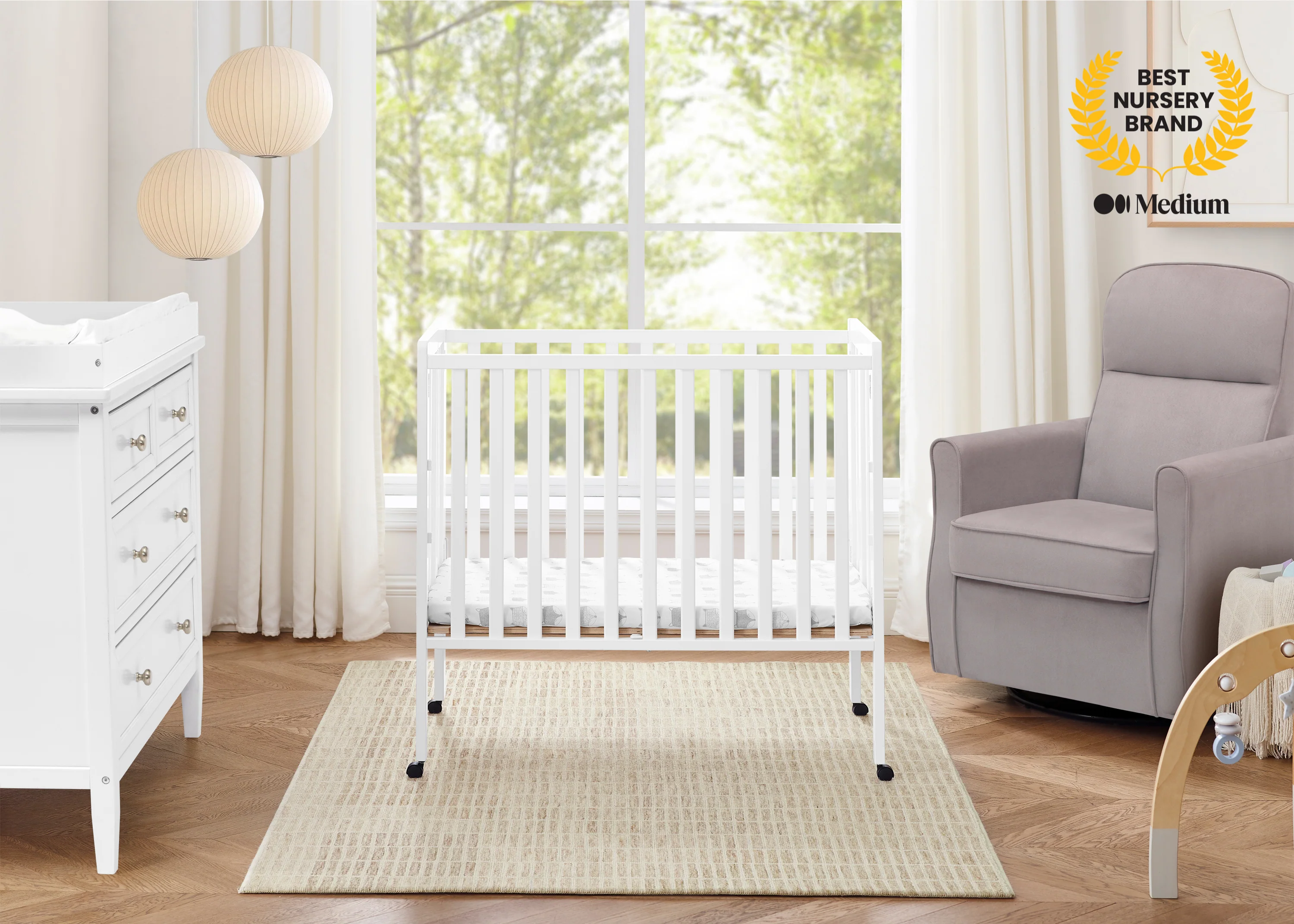 Lee Portable Folding Mini Crib with 1.5-Inch Mattress - Image 17